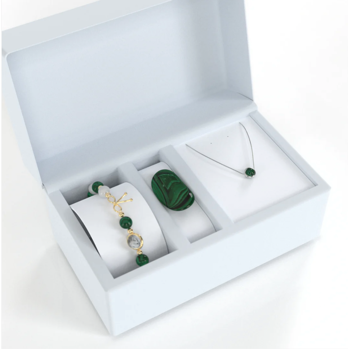 Coffret anti-douleur composé d'un Bracelet anti-douleur avec pierres naturelles de malachite et de pierre de lune qui alternent avec de petites billes en or fin entre elles, avec une seule pierre de quartz rutile en son centre, entourée d'un anneau en or fin, ainsi qu’une pierre en malachite pure et un collier en argent 925 en fragment de coeur de malachite pure